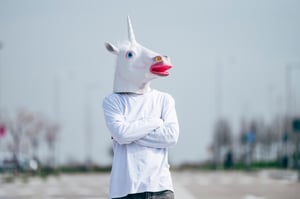 Man with Unicorn Mask On